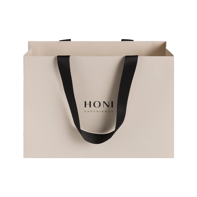 Borse regalo di lusso moda personalizzata Borsa di carta bianca Borsa per l'imballaggio per la spesa per i vestiti